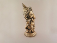 Baby Ganesha Joyously Playing Flute