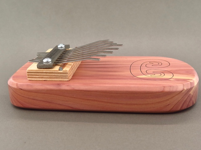 Handcrafted Cedar Board Kalimba with Petroglyph - Click Image to Close