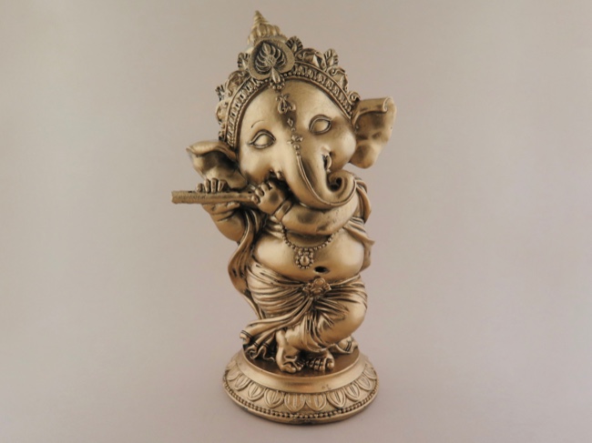 Baby Ganesha Joyously Playing Flute - Click Image to Close